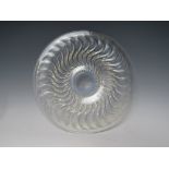 A RENE LALIQUE ACTINIA PATTERN GRADUATED OPALESCENT GLASS PLATE, circa. 1933, moulded with a