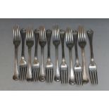 A MATCHED SET OF TWELVE HALLMARKED SILVER DINNER FORKS, consisting of ten by Samuel Hayne & Dudley