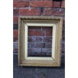 A 19TH CENTURY GOLD FRAME WITH GOLD SLIP, acanthus leaf design to outer edge, frame W 7 cm, slip