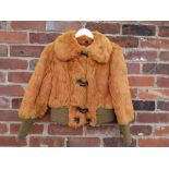 A VINTAGE 1970s BURNT ORANGE CONEY FUR JACKET, with typical shaped collar, elasticated waist and