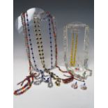 A COLLECTION OF VINTAGE AND MODERN GLASS BEAD NECKLACES ETC., to include a modern multicoloured