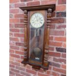 A GUSTAV BECKER DOUBLE WEIGHT VIENNA WALL CLOCK, the mahogany veneered case having celluloid dial,