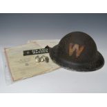 AN AIR RAID WARDENS HELMET, BRONZE AIR RAID WARDEN PLAQUE AND SIX ARP BUTTONS, together with a