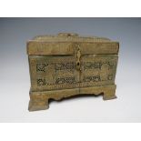 A VINTAGE DECORATIVE PIERCED BRASS CASKET, with mythical figures and script embellishment, W 23