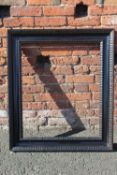 A LARGE LATE 19TH / EARLY 20TH CENTURY EBONISED DUTCH RIPPLE FRAME, frame W 10 cm, rebate 78 x 65