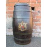 A 19TH CENTURY ROYAL NAVAL GIN BARREL WITH COAT OF ARMS, the oak barrel having brass banding, centra