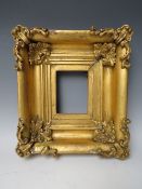 AN 18TH CENTURY SMALL GOLD SWEPT FRAME, frame W 9 cm, rebate 15.5 x 12.5 cm