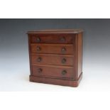 A MINIATURE MAHOGANY CHEST OF DRAWS, H 23 cmCondition Report:small chip to front base