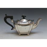 A HALLMARKED SILVER TEAPOT - BIRMINGHAM 1919, hallmarks rubbed, ebonised handle, approx weight 335g,