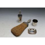 A COLLECTION OF SILVER AND PLATEDWARE, to include a crumb brush and a small silver ashtray (4)