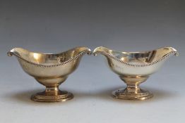 A PAIR OF HALLMARKED SILVER TABLE SALTS - LONDON 1896, makers mark JP over PP?, approx combined