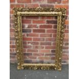 A 20TH CENTURY GOLD PIERCED FRAME, frame W 13 cm, rebate 93 x 63 cm