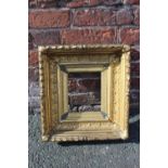 AN 18TH CENTURY CONTINENTAL DECORATIVE GOLD FRAME, with acanthus leaf design to outer edge, frame
