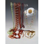 A COLLECTION OF VINTAGE LUCITE / PLASTIC BEAD NECKLACES, together with a small selection of
