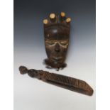 AN EARLY 20TH CENTURY TRIBAL ART WEST AFRICAN GUERE WOBE MASK, from Liberia, H 32.4 cm, together