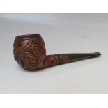 AN EARLY 20TH CENTURY POLYNESIAN NEW ZEALAND MAORI TOBACCO SMOKING PIPE, with carved Tiki face, L 14