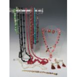 A COLLECTION OF MODERN AND VINTAGE BEAD NECKLACES, to include a mid-century satin glass bead