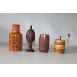 A SMALL TRAY CONTAINING FOUR ITEMS OF TREEN, to include an apothecary container Dublin, a nutmeg