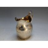 A HALLMARKED SILVER CREAM JUG - LONDON 1801, makers mark rubbed, gilded interior, approx weight 90g,