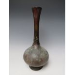 AN ORIENTAL BRONZE BALUSTER VASE, of plain form, H 32.5 cm S/D