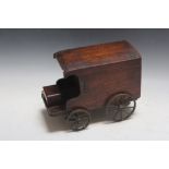 A NOVELTY CIGAR BOX IN THE FORM OF A COACH, RD 294660, W 29.25 cm