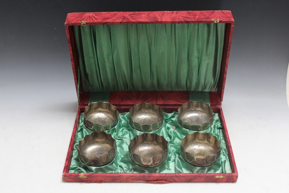 A CASED SET OF SIX WHITE METAL CONTINENTAL FINGER BOWLS, unmarked and untested, Dia 10 cm