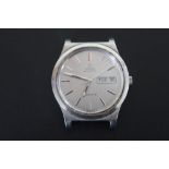 OMEGA - AN AUTOMATIC DAY DATE VINTAGE WATCH, no bracelet, silvered dial, Dia 4 cm