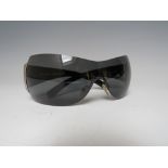 A PAIR OF PRADA SPR 041 DESIGNER SUNGLASSES