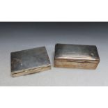 TWO HALLMARKED SILVER CIGARETTE BOXES, both A/F, largest W 18 cm