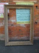 A LARGE 19TH CENTURY GILTWOOD RECTANGULAR PICTURE FRAME, with moulded detail throughout, rebate