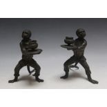 A PAIR OF NOVELTY CAST BRONZE CANDLESTICKS IN THE FORM OF MONKEYS, H 17 cm