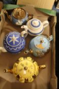 A TRAY OF VICTORIAN TEAPOTS ETC