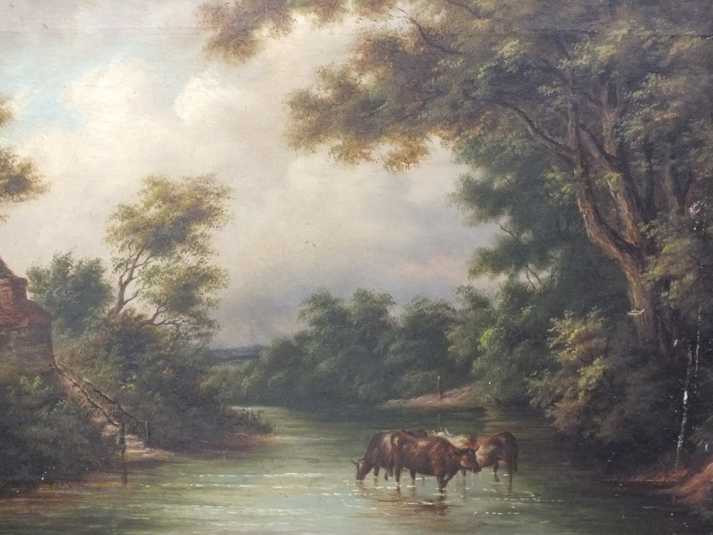 AN ANTIQUE GILT FRAMED OIL ON CANVAS DEPICTING CATTLE WATERING IN A WOODED LANDSCAPE INDISTINCTLY