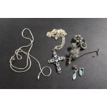 A SILVER CRUCIFIX ON CHAIN SET AND A MARCASITE SET BROOCH