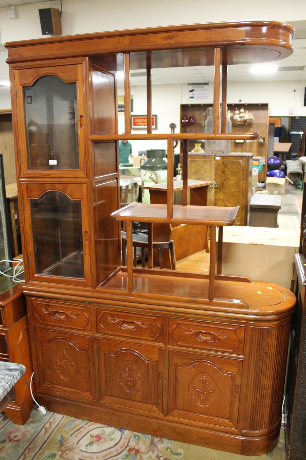 A LARGE MODERN ORIENTAL STYLE GLAZED ROOM DIVIDER IN TWO SECTIONS, DECORATED WITH CARVED FLORAL