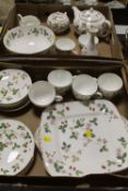 A WEDGWOOD WILD STRAWBERRY SIX PERSON TEASET, FRUIT BOWL ETC CONTAINED IN TWO TRAYS