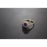 A VINTAGE AMETHYST SET DRESS RING - HALLMARKS INDISTINCT