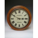 A CIRCULAR OAK CASED DOUBLE FUSEE WALL CLOCK - D.D. PIERCE, WREXHAM, hourly striking on a large