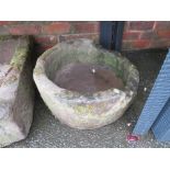 AN ANTIQUE CIRCULAR SANDSTONE TROUGH DIA 55 CM