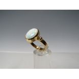 A HALLMARKED 9CT GOLD OPAL SET DRESS RING, opal within a rub over mount approx W 10 cm, H 12 mm,