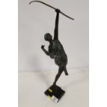 A BRONZE AND COPPER STYLE ART DECO THEME MODEL OF A FEMALE ARCHER - BOW IS BROKEN