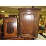 TWO ANTIQUE HANGING CORNER CUPBOARDS