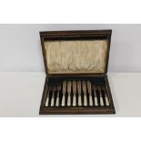 A CASED SET OF MOTHER OF PEARL HANDLED FISH KNIVES AND FORKS
