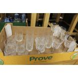 A TRAY OF PRESSED GLASS DRINKING GLASSES COMPRISING OF 6 WINE, 6 WHISKY AND 6 TUMBLERS