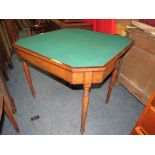 AN ANTIQUE MAHOGANY FOLD-OVER CARD TABLE