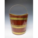 A 19TH CENTURY MAHOGANY BRASS BANDED PAIL, with swing handle, later liner and replacement bottom