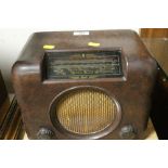 A VINTAGE BUSH BAKELITE RADIO A/F