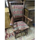 A CARVED EDWARDIAN ROCKING CHAIR