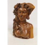 A CARVED WOODEN BUST OF A FEMALE NUDE