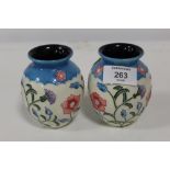 A SMALL PAIR OF OLD TUPTONWARE FLORAL VASES